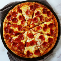 Fresh pizza from Delish Pizza Box
